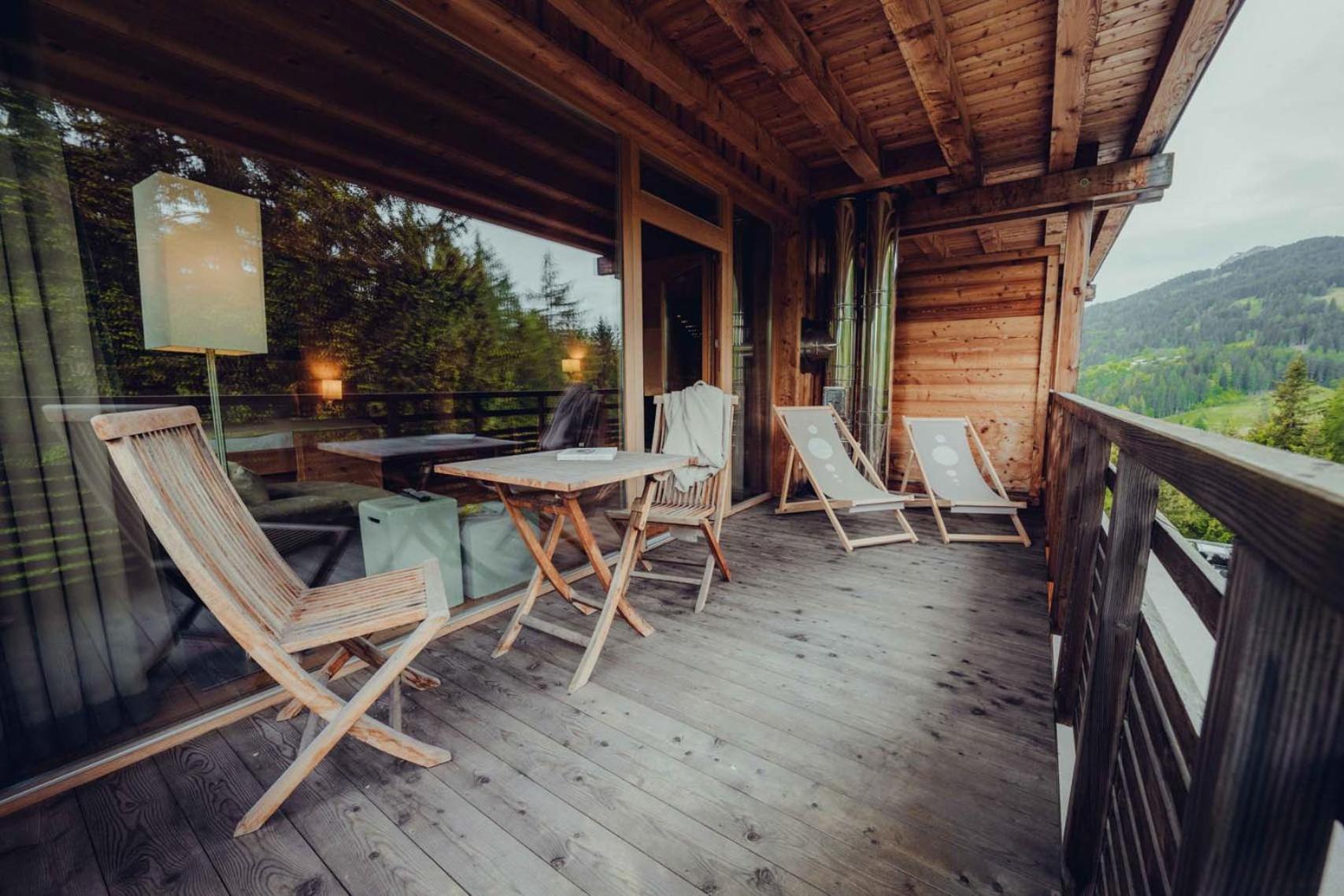 Holzhotel Forsthofalm ลีโอกัง ภายนอก รูปภาพ