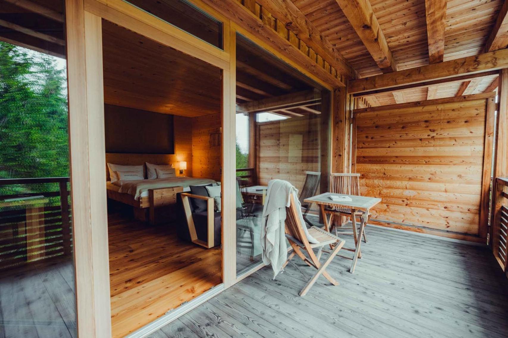 Holzhotel Forsthofalm ลีโอกัง ภายนอก รูปภาพ