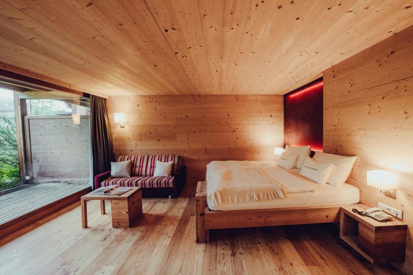 Holzhotel Forsthofalm ลีโอกัง ภายนอก รูปภาพ