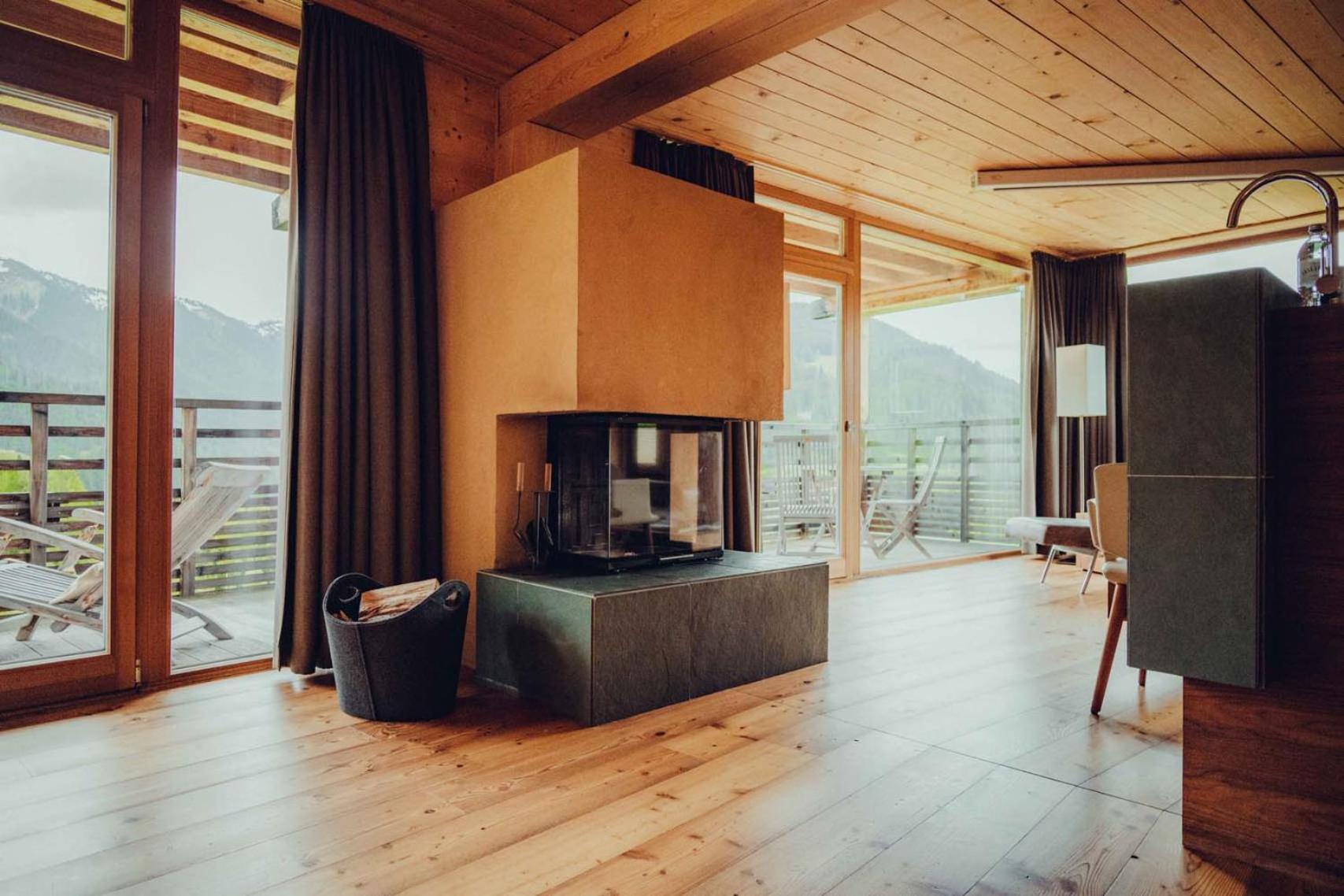 Holzhotel Forsthofalm ลีโอกัง ภายนอก รูปภาพ